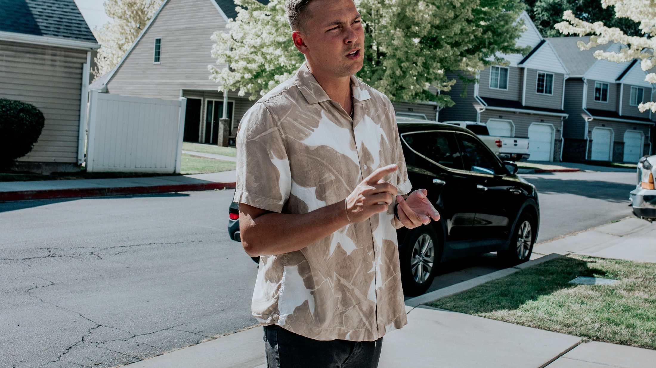 Conner touring a Wasatch Front neighborhood with homebuyers